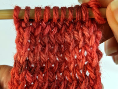 knitting sample with alternating rows of twisted stitches