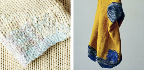 A cream cuff that is heavily darned with a pale pink and blue woven darn; yellow socks with a blue toe and a large darker blue darn at the toe.