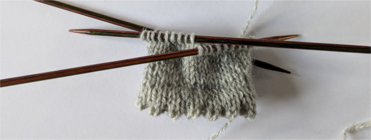 Cuff and body of a mini mitten, up to the thumb placement row