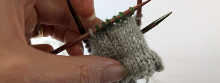 Green stitches back on left hand needle.